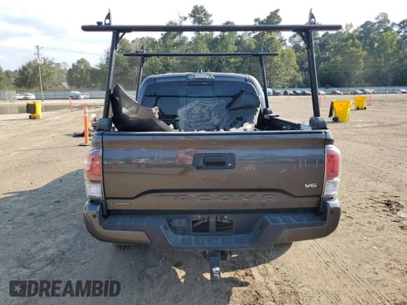 2020 Toyota Tacoma SR5 с VIN 3TMAZ5CN0LM118016, выставлен на аукционе Copart как лот 80166295 с пробегом 82 935 миль миль и Списание • Salvage title. История ставок и продаж доступна на DreamBid. Изображение 6.