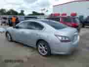 2014 Nissan Maxima SV with VIN 1N4AA5APXEC451832, listed as a IAAI auction lot 42749050 with 137,524 mi miles and . Bid and sale history available at DreamBid. Image 3.