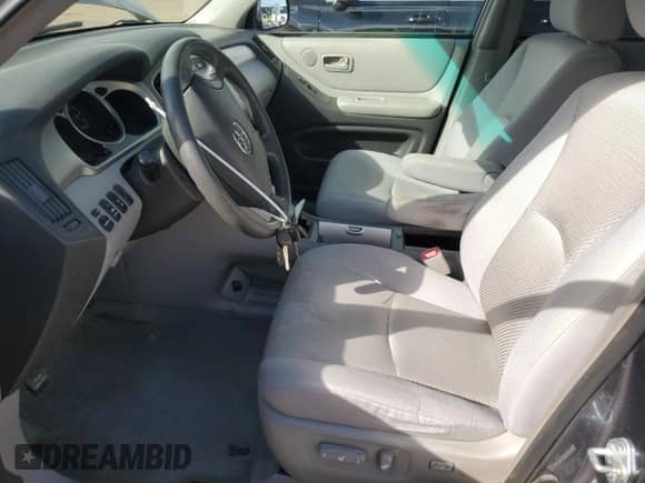 2006 Toyota Highlander w/3rd Row with VIN JTEEP21AX60167118, listed as a Copart auction lot 82180235 with 261,969 mi miles and Salvage title. Bid and sale history available at DreamBid. Image 7.