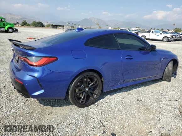 2022 BMW 4 Series M440i xDrive с VIN WBA13AR07NCJ14505, выставлен на аукционе Copart как лот 54756685 с пробегом 28 434 миль миль и Списание • Salvage title. История ставок и продаж доступна на DreamBid. Изображение 3.