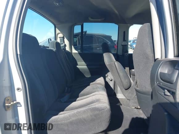 2004 Dodge Dakota Sport z VIN 1D7HG38K34S561735, wystawiony jako IAAI lot #41409622 z przebiegiem Nie podano mil oraz . Historia ofert i sprzedaży dostępna na DreamBid. Obrazek 8.