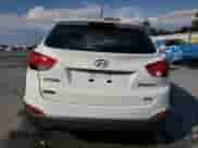 2013 Hyundai Tucson GLS z VIN KM8JUCAC9DU565571, wystawiony jako Copart lot #71464215 z przebiegiem 153 001 mil mil oraz Szkoda całkowita • Salvage title. Historia ofert i sprzedaży dostępna na DreamBid. Obrazek 6.