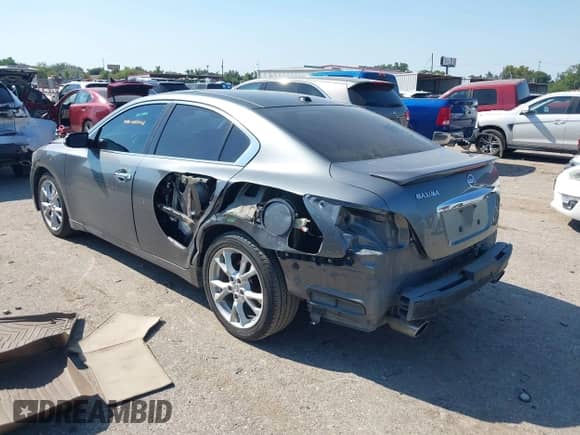 2014 Nissan Maxima SV z VIN 1N4AA5AP7EC488689, wystawiony jako IAAI lot #43153163 z przebiegiem 238 142 mil mil oraz . Historia ofert i sprzedaży dostępna na DreamBid. Obrazek 3.