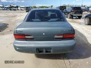 1995 Chevrolet Prizm z VIN 1Y1SK5282SZ017458, wystawiony jako Copart lot #80265735 z przebiegiem 260 827 mil mil oraz Czysty tytuł • Clean title. Historia ofert i sprzedaży dostępna na DreamBid. Obrazek 6.