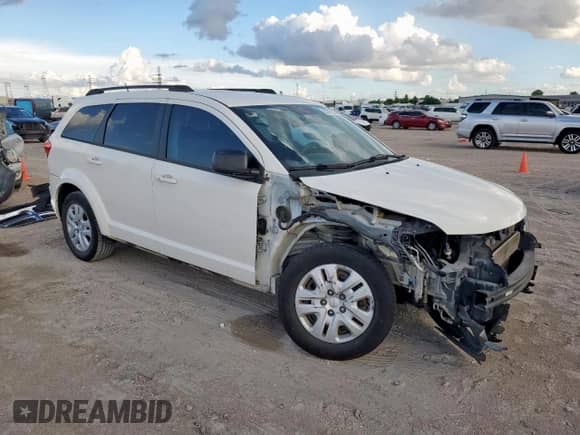 2013 Dodge Journey SE z VIN 3C4PDCABXDT695293, wystawiony jako Copart lot #83797235 z przebiegiem 167 499 mil mil oraz Szkoda całkowita • Salvage title. Historia ofert i sprzedaży dostępna na DreamBid. Obrazek 4.