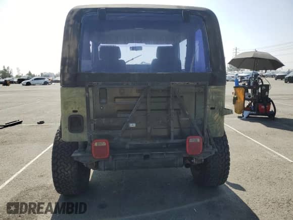 1995 Jeep Wrangler S с VIN 1J4FY19P6SP210843, выставлен на аукционе Copart как лот 84998205 с пробегом 151 629 миль миль и Чистый • Clean title. История ставок и продаж доступна на DreamBid. Изображение 6.