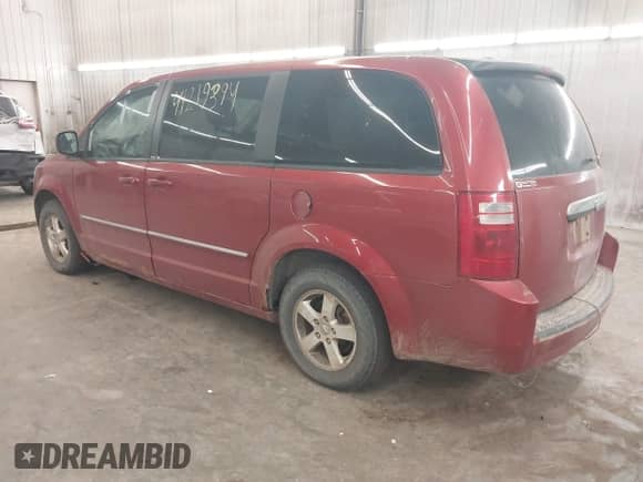 2008 Dodge Grand Caravan SXT z VIN 1D8HN54P98B166074, wystawiony jako IAAI lot #41219394 z przebiegiem 139 033 mil mil oraz . Historia ofert i sprzedaży dostępna na DreamBid. Obrazek 3.