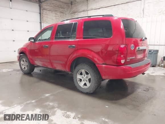 2005 Dodge Durango SLT with VIN 1D4HB48N95F556612, listed as a IAAI auction lot 42564297 with 165,324 mi miles and . Bid and sale history available at DreamBid. Image 3.