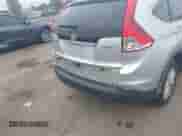 2014 Honda CR-V EX-L with VIN 2HKRM4H72EH609315, listed as a IAAI auction lot 43323930 with 142,569 mi miles and . Bid and sale history available at DreamBid. Image 6.