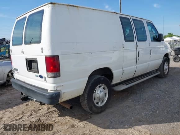 2013 Ford Econoline Cargo Commercial with VIN 1FTNE2EW3DDA80120, listed as a IAAI auction lot 42240732 with 292,927 mi miles and . Bid and sale history available at DreamBid. Image 4.
