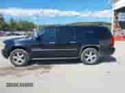 2009 Chevrolet Suburban LTZ z VIN 1GNFK36349R294901, wystawiony jako IAAI lot #43203353 z przebiegiem 187 400 mil mil oraz . Historia ofert i sprzedaży dostępna na DreamBid. Obrazek 15.