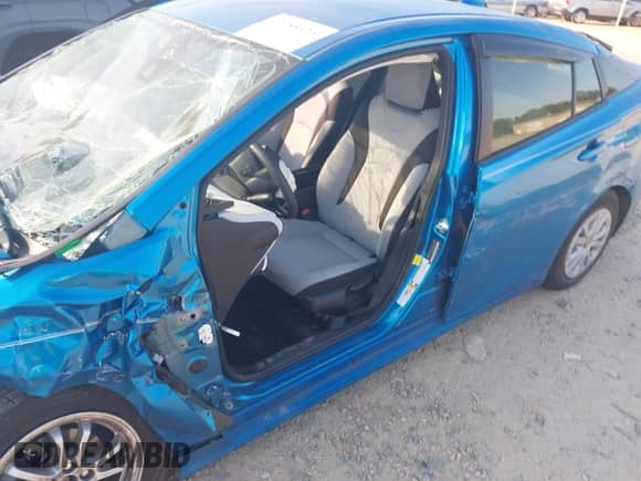 2021 Toyota Prius L Eco with VIN JTDKAMFU1M3136133, listed as a IAAI auction lot 43285926 with 49,911 mi miles and . Bid and sale history available at DreamBid. Image 17.