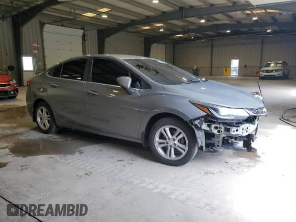 2017 Chevrolet Cruze LT с VIN 1G1BE5SM2H7171089, выставлен на аукционе Copart как лот 68960295 с пробегом 65 899 миль миль и Списание • Salvage title. История ставок и продаж доступна на DreamBid. Изображение 4.