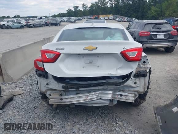 2018 Chevrolet Cruze LT с VIN 1G1BE5SM5J7153286, выставлен на аукционе IAAI как лот 43123664 с пробегом 97 154 миль миль и . История ставок и продаж доступна на DreamBid. Изображение 16.