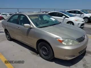 2002 Toyota Camry LE с VIN 4T1BE30K42U564464, выставлен на аукционе IAAI как лот 42312453 с пробегом 158 972 миль миль и . История ставок и продаж доступна на DreamBid. Изображение 1.