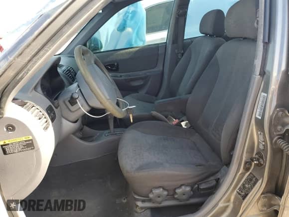 2003 Hyundai Accent GL z VIN KMHCG45C73U471607, wystawiony jako Copart lot #58813445 z przebiegiem 222 326 mil mil oraz Nie do naprawy • Non repairable. Historia ofert i sprzedaży dostępna na DreamBid. Obrazek 7.