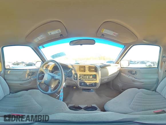 2000 Chevrolet Blazer LT with VIN 1GNCS13W9Y2145607, listed as a Copart auction lot 82137674 with 96,686 mi miles and Salvage title. Bid and sale history available at DreamBid. Image 14.