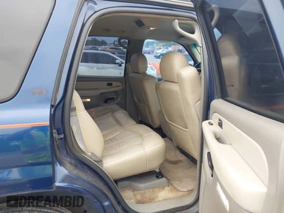 2002 Chevrolet Tahoe LS z VIN 1GNEC13Z62R217457, wystawiony jako IAAI lot #42408866 z przebiegiem 246 590 mil mil oraz . Historia ofert i sprzedaży dostępna na DreamBid. Obrazek 8.