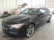 2011 BMW 7 Series 750Li xDrive with VIN WBAKC8C58BC432517, listed as a IAAI auction lot 41874352 with 125,288 mi miles and . Bid and sale history available at DreamBid. Image 2.