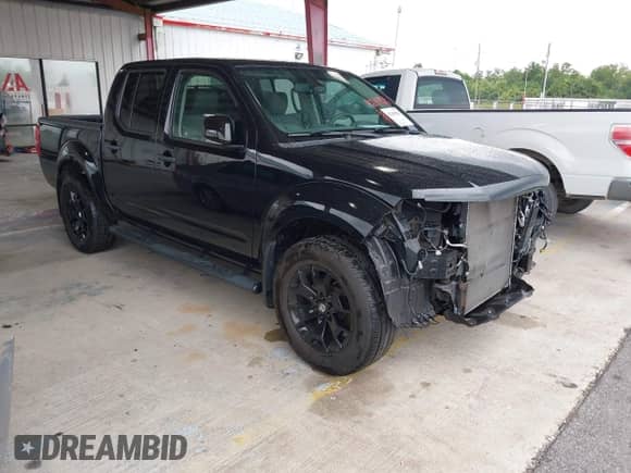 2020 Nissan Frontier Pro-4X with VIN 1N6ED0EB7LN702647, listed as a IAAI auction lot 42319424 with 65,267 mi miles and . Bid and sale history available at DreamBid. Image 1.