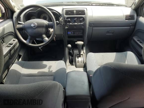 2004 Nissan Frontier SC with VIN 1N6MD29Y74C454676, listed as a Copart auction lot 65729365 with 111,201 mi miles and Salvage title. Bid and sale history available at DreamBid. Image 8.