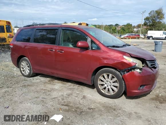 2012 Toyota Sienna XLE with VIN 5TDDK3DC7CS037517, listed as a Copart auction lot 86639205 with 295,162 mi miles and Salvage title. Bid and sale history available at DreamBid. Image 4.