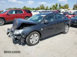 2014 Chevrolet Cruze LS with VIN 1G1PB5SH7E7325583, listed as a Copart auction lot 71112385 with 156,893 mi miles and Salvage title. Bid and sale history available at DreamBid. Image 1.