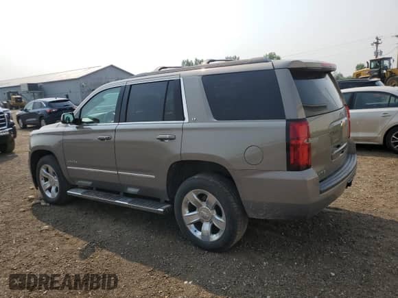 2018 Chevrolet Tahoe LT z VIN 1GNSKBKC8JR348459, wystawiony jako Copart lot #67358825 z przebiegiem 118 950 mil mil oraz Szkoda całkowita • Salvage title. Historia ofert i sprzedaży dostępna na DreamBid. Obrazek 2.