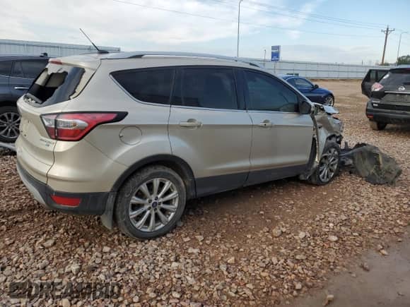 2017 Ford Escape Titanium with VIN 1FMCU9J91HUD60350, listed as a Copart auction lot 67822375 with 149,446 mi miles and Salvage title. Bid and sale history available at DreamBid. Image 3.