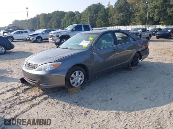 2003 Toyota Camry XLE with VIN 4T1BE32K53U668153, listed as a IAAI auction lot 43249059 with 194,101 mi miles and . Bid and sale history available at DreamBid. Image 2.