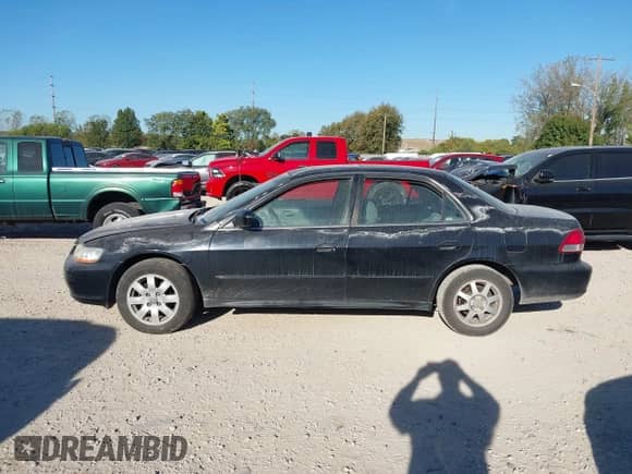 2002 Honda Accord EX with VIN 1HGCG55612A134582, listed as a IAAI auction lot 43419576 with 344,066 mi miles and . Bid and sale history available at DreamBid. Image 14.