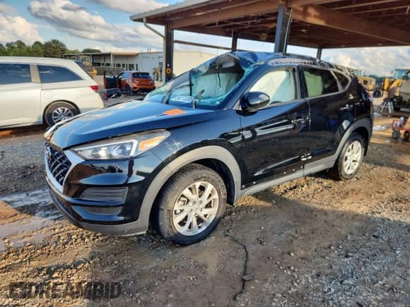 2020 Hyundai Tucson SE with VIN KM8J23A41LU106967, listed as a Copart auction lot 84273005 with 105,162 mi miles and Salvage title. Bid and sale history available at DreamBid. Image 1.