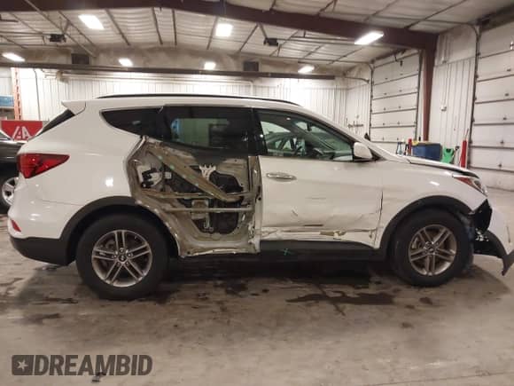 2017 Hyundai Santa Fe 2.4L with VIN 5NMZUDLBXHH015181, listed as a IAAI auction lot 43286360 with 85,190 mi miles and . Bid and sale history available at DreamBid. Image 14.