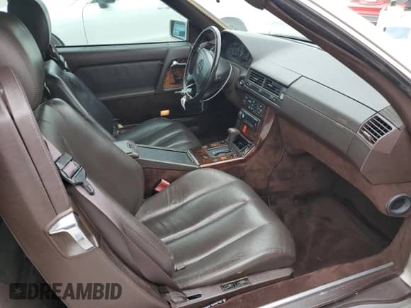 1992 Mercedes-Benz SL с VIN WDBFA66E0NF052678, выставлен на аукционе Copart как лот 80767464 с пробегом 141 748 миль миль и Чистый • Clean title. История ставок и продаж доступна на DreamBid. Изображение 10.