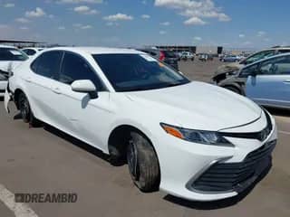 2022 Toyota Camry Hybrid LE with VIN 4T1C31AK8NU594181, listed as a IAAI auction lot 42666278 with 35,921 mi miles and . Bid and sale history available at DreamBid. Image 1.