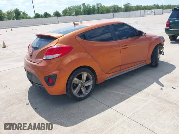 2013 Hyundai Veloster Turbo с VIN KMHTC6AE4DU169787, выставлен на аукционе IAAI как лот 43334701 с пробегом 114 117 миль миль и . История ставок и продаж доступна на DreamBid. Изображение 4.