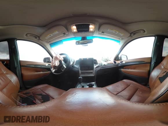 2012 Jeep Grand Cherokee Overland z VIN 1C4RJECT5CC157498, wystawiony jako IAAI lot #42414872 z przebiegiem 133 087 mil mil oraz . Historia ofert i sprzedaży dostępna na DreamBid. Obrazek 19.