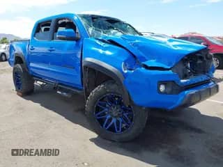 2021 Toyota Tacoma SR with VIN 3TMCZ5AN0MM377425, listed as a IAAI auction lot 43232397 with Not provided miles and . Bid and sale history available at DreamBid. Image 1.