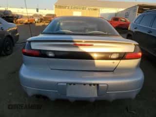 1998 Dodge Avenger z VIN 4B3AU42N0WE133443, wystawiony jako Copart lot #74848614 z przebiegiem 229 084 mil mil oraz Czysty tytuł • Clean title. Historia ofert i sprzedaży dostępna na DreamBid. Obrazek 6.