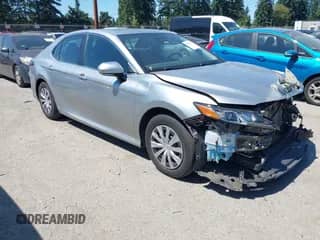 2023 Toyota Camry Hybrid LE with VIN 4T1H31AK0PU604131, listed as a IAAI auction lot 42864131 with 36,341 mi miles and . Bid and sale history available at DreamBid. Image 1.