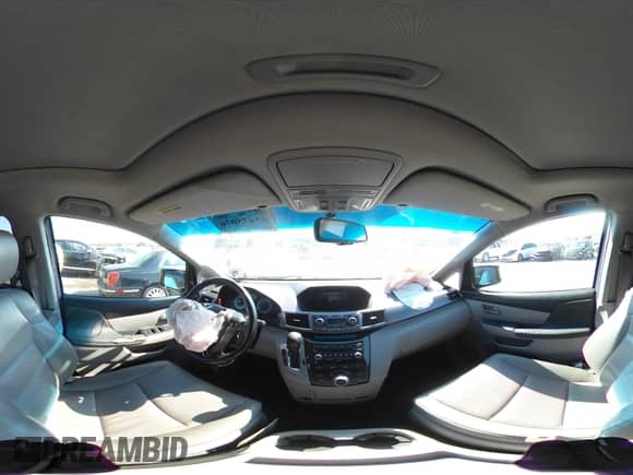 2012 Honda Odyssey Touring with VIN 5FNRL5H97CB130670, listed as a IAAI auction lot 43438076 with 198,047 mi miles and . Bid and sale history available at DreamBid. Image 18.