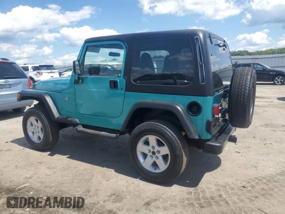 2002 Jeep Wrangler X z VIN 1J4FA39SX2P731469, wystawiony jako Copart lot #71106525 z przebiegiem 199 317 mil mil oraz Czysty tytuł • Clean title. Historia ofert i sprzedaży dostępna na DreamBid. Obrazek 2.
