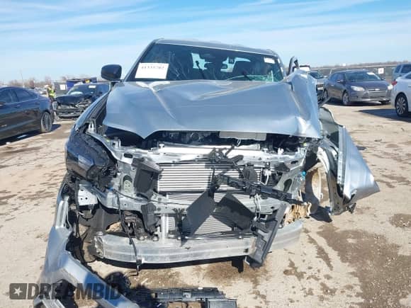 2024 Toyota Tacoma SR with VIN 3TYKD5HN4RT016047, listed as a IAAI auction lot 41335702 with Not provided miles and . Bid and sale history available at DreamBid. Image 12.