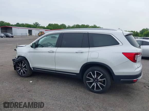 2022 Honda Pilot Elite z VIN 5FNYF6H0XNB030575, wystawiony jako IAAI lot #42351191 z przebiegiem 81 671 mil mil oraz . Historia ofert i sprzedaży dostępna na DreamBid. Obrazek 14.