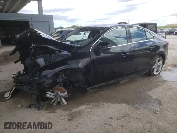 2015 Volvo S60 T5 Drive-E Premier with VIN YV126MFK8F1343062, listed as a Copart auction lot 70910615 with 107,097 mi miles and Salvage title. Bid and sale history available at DreamBid. Image 1.