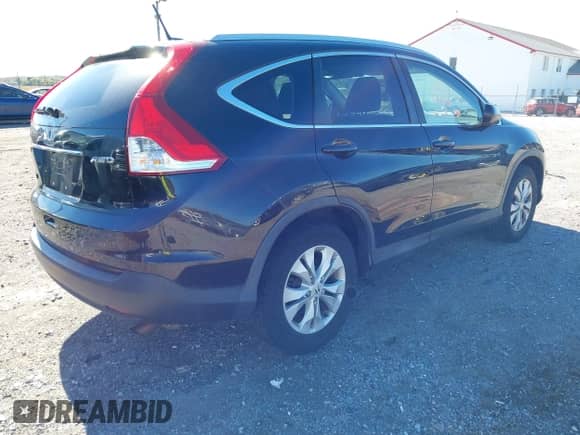 2014 Honda CR-V EX-L with VIN 2HKRM4H77EH709636, listed as a IAAI auction lot 43489495 with 211,099 mi miles and . Bid and sale history available at DreamBid. Image 4.