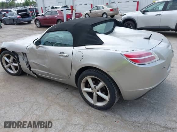 2009 Saturn Sky with VIN 1G8MC35B59Y100284, listed as a IAAI auction lot 42260987 with 86,049 mi miles and . Bid and sale history available at DreamBid. Image 3.
