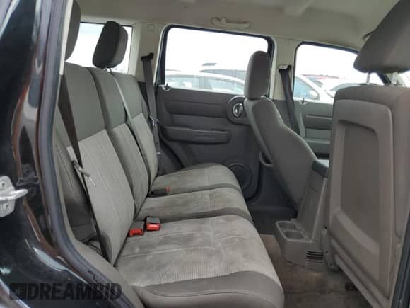 2009 Dodge Nitro SXT с VIN 1D8GU28K59W527001, выставлен на аукционе Copart как лот 77988964 с пробегом 157 787 миль миль и Списание • Salvage title. История ставок и продаж доступна на DreamBid. Изображение 11.