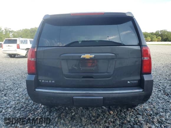 2017 Chevrolet Tahoe Premier with VIN 1GNSCCKC5HR227109, listed as a Copart auction lot 60874855 with 132,550 mi miles and Salvage title. Bid and sale history available at DreamBid. Image 6.