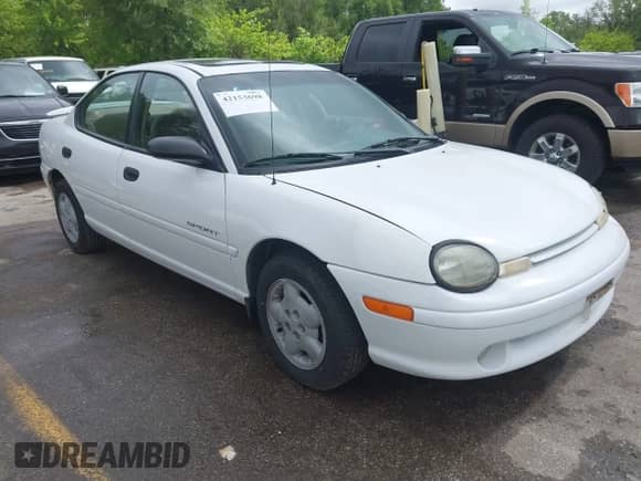 1999 Dodge Neon z VIN 1B3ES47Y6XD157331, wystawiony jako IAAI lot #42153698 z przebiegiem 218 408 mil mil oraz . Historia ofert i sprzedaży dostępna na DreamBid. Obrazek 1.